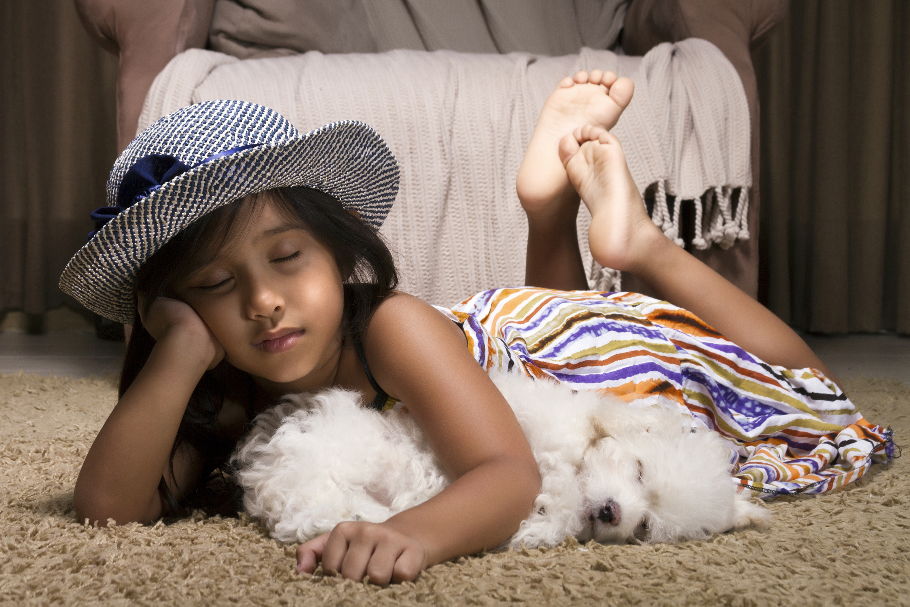 Dog and girl on clean carpet